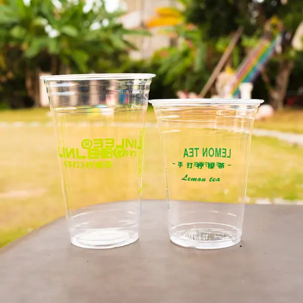 Tasse de glace en PET transparente utilisée pour le thé au citron et les boissons glacées avec une marque personnalisée